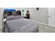 Comfortable bedroom with lots of storage and cozy bedding at 5683 Oakmont Blvd, Bargersville, IN 46106