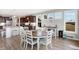 Bright dining area has many windows and is adjacent to an open kitchen for easy entertaining at 5683 Oakmont Blvd, Bargersville, IN 46106