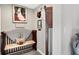 Hallway nook with a padded bench, Gathering photos and a decorative display at 5683 Oakmont Blvd, Bargersville, IN 46106