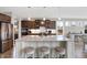 Kitchen island with granite countertops, seating, stainless steel appliances, and cabinets at 5683 Oakmont Blvd, Bargersville, IN 46106