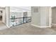 Loft space with carpeting, a decorative railing and lots of natural light at 5683 Oakmont Blvd, Bargersville, IN 46106