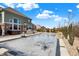 Large pool area with a partially covered pool, back patio, and green backyard at 5683 Oakmont Blvd, Bargersville, IN 46106