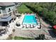 Aerial view showcasing the inviting swimming pool, hot tub, gazebo, and patio area, creating an ideal backyard oasis at 5683 Oakmont Blvd, Bargersville, IN 46106