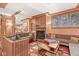 Basement area with a fireplace, window, hardwood floors, and custom millwork at 5977 S 800 E, Zionsville, IN 46077