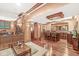 Spacious basement with custom millwork, a wet bar, and wood floors at 5977 S 800 E, Zionsville, IN 46077