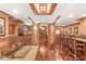 Entertainment basement featuring a bar area, custom woodwork, and a cozy seating nook at 5977 S 800 E, Zionsville, IN 46077