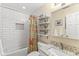 Bright bathroom with subway tile surround, decorative shower curtain, and vanity at 5977 S 800 E, Zionsville, IN 46077
