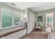 Bright bedroom with a window seat and a chair at 5977 S 800 E, Zionsville, IN 46077