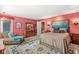 Comfortable bedroom with area rug, accent chair and colorful throw pillows at 5977 S 800 E, Zionsville, IN 46077
