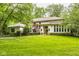 Beautiful home showcasing lush lawn, elegant architecture, and manicured landscaping at 5977 S 800 E, Zionsville, IN 46077