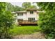 A beautiful home's deck can be seen through the trees at 5977 S 800 E, Zionsville, IN 46077