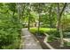 Scenic front view of the property with a long driveway and well-maintained landscaping at 5977 S 800 E, Zionsville, IN 46077