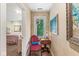 Hallway with a small seat, a window with natural light, and artwork on the walls at 5977 S 800 E, Zionsville, IN 46077