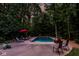 Backyard pool with patio and lush landscaping providing privacy at 5977 S 800 E, Zionsville, IN 46077