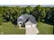 Aerial view of a stunning home with well-maintained landscaping and a spacious driveway at 6208 W Foster Ridge Ln, Pendleton, IN 46064