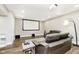 Spacious basement with a home theater setup, comfy leather seating and modern lighting at 6208 W Foster Ridge Ln, Pendleton, IN 46064