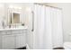 Clean bathroom featuring a shower with a white curtain and a vanity with a marble countertop at 6208 W Foster Ridge Ln, Pendleton, IN 46064