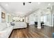 Bright and open living space with hardwood floors and seamless transition to the dining and kitchen areas at 6208 W Foster Ridge Ln, Pendleton, IN 46064