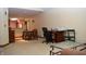 Spacious basement with dining area, workspace, and comfortable seating, offering ample space for Gathering activities at 6725 Bridgefield Way # 1, Indianapolis, IN 46254
