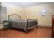 Bedroom with wood floors, a white board, and furniture set at 6725 Bridgefield Way # 1, Indianapolis, IN 46254