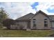 Charming brick home with manicured lawn and tasteful landscaping at 6725 Bridgefield Way # 1, Indianapolis, IN 46254