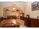 Bright living room boasts vaulted ceilings, a cozy fireplace, and tasteful decor in an inviting open layout at 6725 Bridgefield Way # 1, Indianapolis, IN 46254