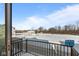Inviting balcony view overlooking serene landscape, offering a peaceful outdoor retreat with blue skies above at 7070 Nine Penny Dr, Brownsburg, IN 46112