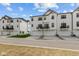 New townhomes with rear garages, balconies, and modern design elements, providing an upscale feel at 7070 Nine Penny Dr, Brownsburg, IN 46112