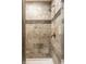 Tiled shower with modern fixtures and accents at 735 Lexington Ave # 1, Indianapolis, IN 46203