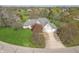 Expansive aerial view of a well-kept home, showcasing its large lot, mature trees, and neighborhood setting at 7472 Windridge Way, Brownsburg, IN 46112
