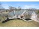 Stunning brick home with a meticulously landscaped yard, mature trees and an attached two-car garage at 7472 Windridge Way, Brownsburg, IN 46112