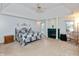 Spacious main bedroom with tray ceilings, fireplace, and ample natural light at 7472 Windridge Way, Brownsburg, IN 46112
