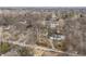 Panoramic aerial view of a residential neighborhood with tree-lined streets, sidewalks, and varying home styles at 8001 N Illinois St, Indianapolis, IN 46260