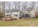 Scenic backyard view with a patio, balcony, and lush greenery providing a serene outdoor space at 8001 N Illinois St, Indianapolis, IN 46260