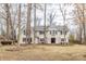 Charming two-story home with blue shutters and well-maintained landscaping at 8001 N Illinois St, Indianapolis, IN 46260