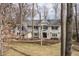 Attractive two-story home boasting dark shutters, a symmetrical facade, and lush front lawn at 8001 N Illinois St, Indianapolis, IN 46260
