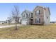 Inviting two-story home with a well-maintained lawn, mature tree, and a two-car garage at 8193 Cagles Mill Trce, Avon, IN 46123