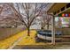 Backyard with an above ground pool, a decorative tree, and a shed at 825 N Bancroft St, Indianapolis, IN 46201