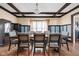 Elegant dining room with coffered ceilings and a large wooden table at 825 N Bancroft St, Indianapolis, IN 46201