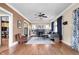 Inviting living room with hardwood floors, fireplace, and ample natural light at 825 N Bancroft St, Indianapolis, IN 46201
