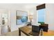 Bright home office space featuring modern desk, decor, and comfortable seating at 9434 Abner St, McCordsville, IN 46055