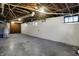 Unfinished basement with block walls and utilities at 959 E Bradbury Ave, Indianapolis, IN 46203