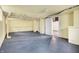 Spacious unfinished basement with concrete floor, white walls, and ample room for storage or customization at 959 E Bradbury Ave, Indianapolis, IN 46203