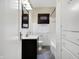 Clean bathroom with vanity, mirror, and shower/tub combination at 959 E Bradbury Ave, Indianapolis, IN 46203