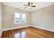 Bedroom featuring a ceiling fan and a large window providing natural light at 959 E Bradbury Ave, Indianapolis, IN 46203