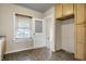 Functional kitchen boasts laminate flooring, plentiful cabinet space, and lots of light at 959 E Bradbury Ave, Indianapolis, IN 46203