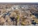 This aerial view highlights the property's location within a vibrant community with nearby shopping and dining at 1020 E 51St St, Indianapolis, IN 46205