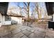 Backyard patio featuring flagstone tiling and outdoor seating at 1020 E 51St St, Indianapolis, IN 46205