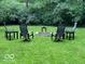 Inviting backyard fire pit with chairs, ideal for cozy outdoor evenings and entertainment at 1020 E 51St St, Indianapolis, IN 46205