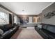 A spacious living room boasting carpet flooring and sleek, modern decor at 1020 E 51St St, Indianapolis, IN 46205